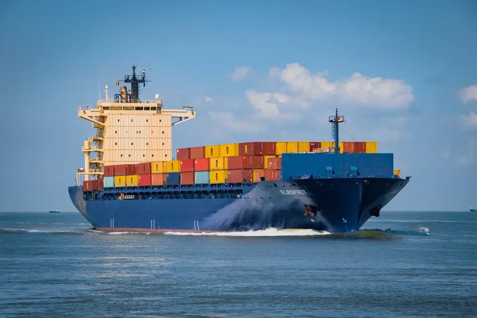 A loaded container ship under way at sea